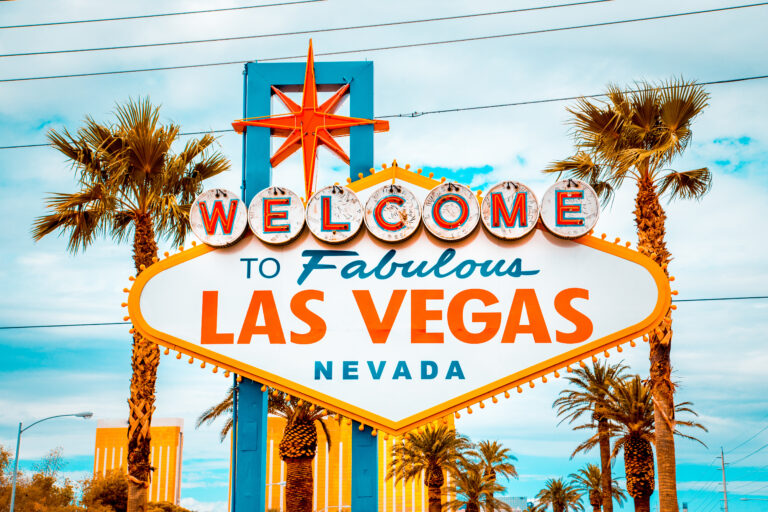 Classic view of Welcome to Fabulous Las Vegas sign at the south end of world famous Las Vegas strip on a beautiful sunny day with blue sky and clouds, Las Vegas, Nevada, USA