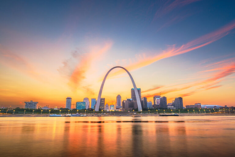 St. Louis, Missouri, USA downtown cityscape on the Mississippi River at twilight.