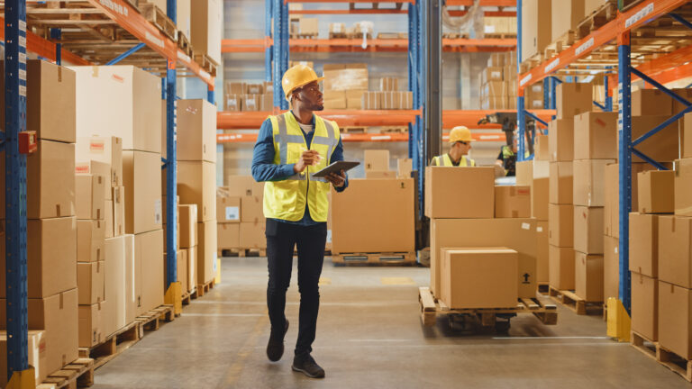 Handsome Male Worker Wearing Hard Hat Holding Digital Tablet Com